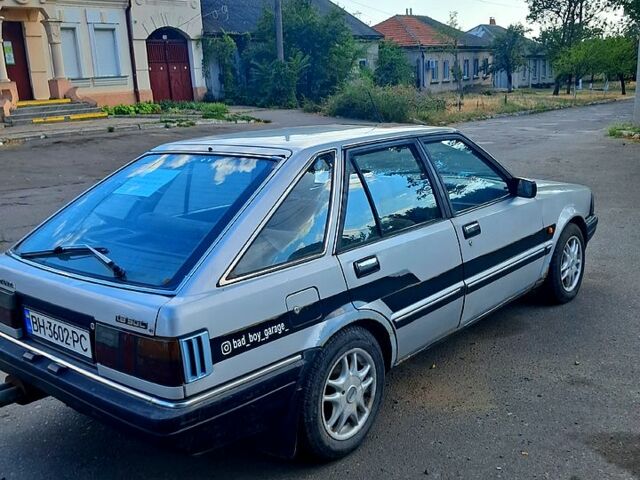 Серый Ниссан Станза, объемом двигателя 1.8 л и пробегом 315 тыс. км за 1000 $, фото 1 на Automoto.ua