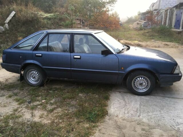 Синий Ниссан Станза, объемом двигателя 1.8 л и пробегом 214 тыс. км за 500 $, фото 1 на Automoto.ua