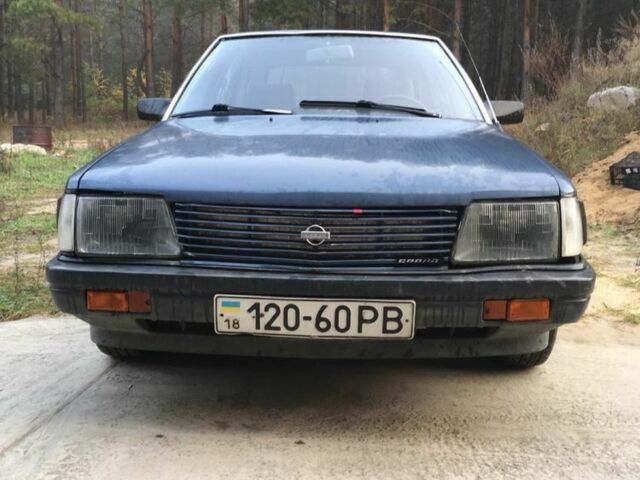 Синий Ниссан Станза, объемом двигателя 1.8 л и пробегом 214 тыс. км за 500 $, фото 2 на Automoto.ua