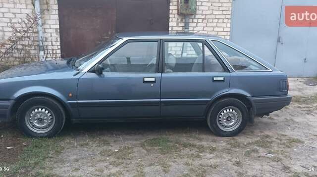 Синій Ніссан Станза, об'ємом двигуна 1.8 л та пробігом 217 тис. км за 1100 $, фото 7 на Automoto.ua