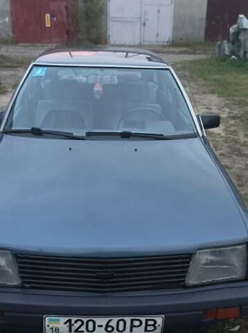 Синій Ніссан Станза, об'ємом двигуна 1.8 л та пробігом 217 тис. км за 1100 $, фото 2 на Automoto.ua