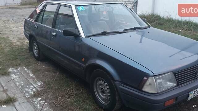 Синій Ніссан Станза, об'ємом двигуна 1.8 л та пробігом 217 тис. км за 1100 $, фото 5 на Automoto.ua