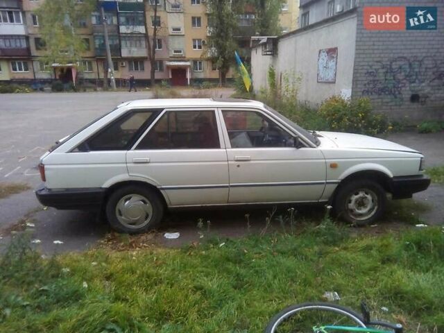 Белый Ниссан Санни, объемом двигателя 1.7 л и пробегом 100 тыс. км за 1100 $, фото 1 на Automoto.ua