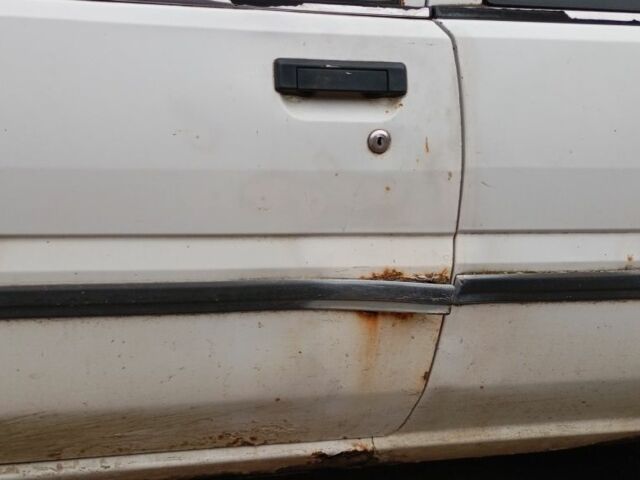 Білий Ніссан Санні, об'ємом двигуна 1 л та пробігом 270 тис. км за 350 $, фото 12 на Automoto.ua