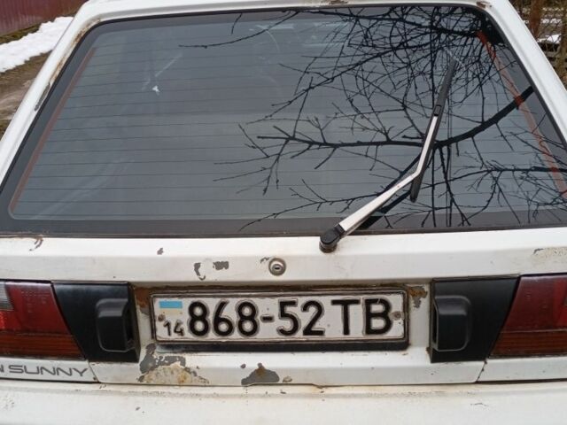 Білий Ніссан Санні, об'ємом двигуна 1 л та пробігом 270 тис. км за 350 $, фото 16 на Automoto.ua