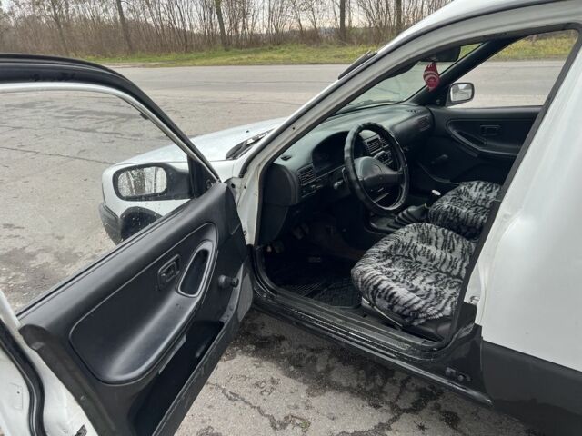 Білий Ніссан Санні, об'ємом двигуна 1.7 л та пробігом 100 тис. км за 1900 $, фото 7 на Automoto.ua