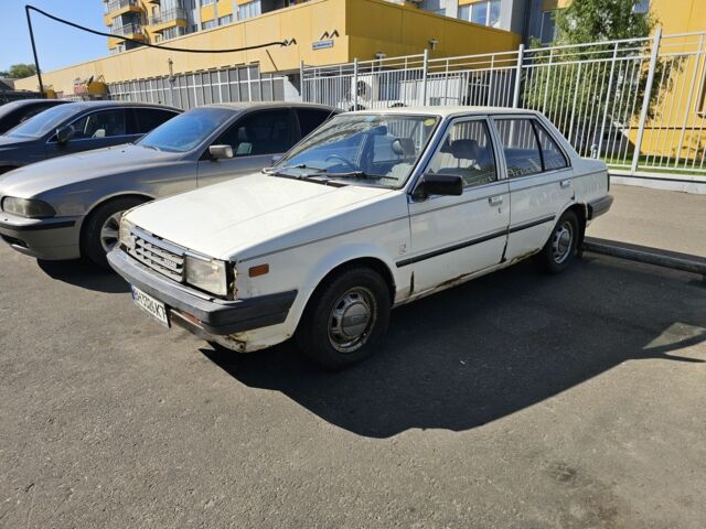 Белый Ниссан Санни, объемом двигателя 1.5 л и пробегом 262 тыс. км за 500 $, фото 1 на Automoto.ua