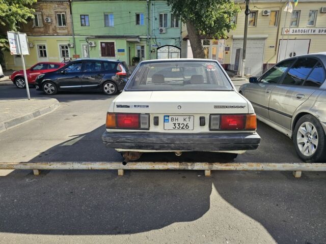 Белый Ниссан Санни, объемом двигателя 1.5 л и пробегом 262 тыс. км за 500 $, фото 3 на Automoto.ua