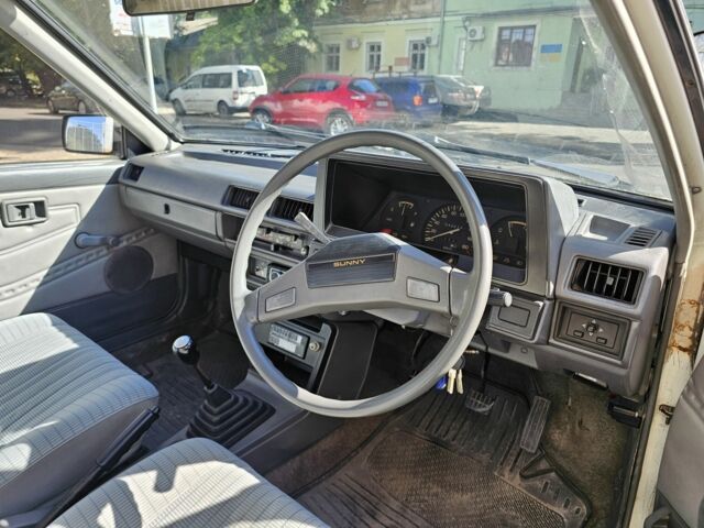 Белый Ниссан Санни, объемом двигателя 1.5 л и пробегом 262 тыс. км за 500 $, фото 4 на Automoto.ua