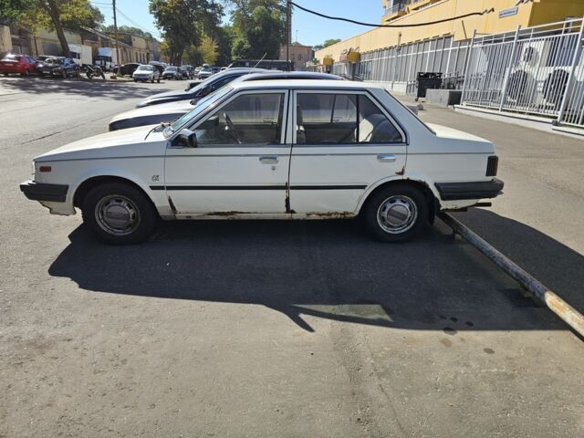 Белый Ниссан Санни, объемом двигателя 1.5 л и пробегом 262 тыс. км за 500 $, фото 2 на Automoto.ua