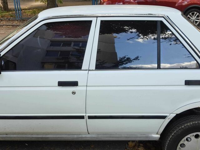 Белый Ниссан Санни, объемом двигателя 1.7 л и пробегом 280 тыс. км за 1033 $, фото 6 на Automoto.ua