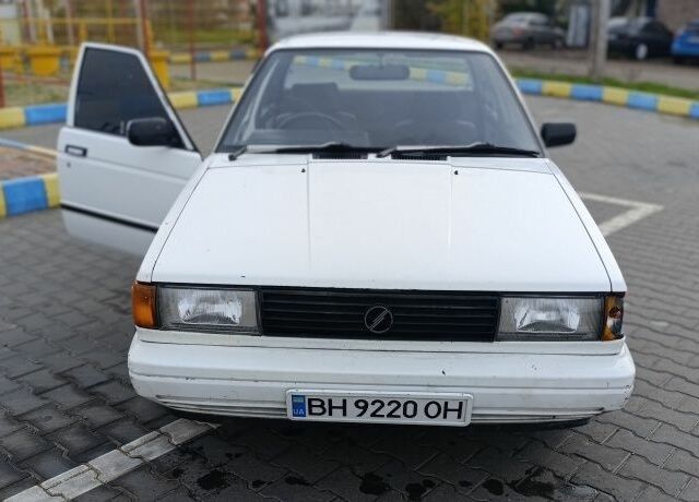 Белый Ниссан Санни, объемом двигателя 1.3 л и пробегом 260 тыс. км за 550 $, фото 11 на Automoto.ua