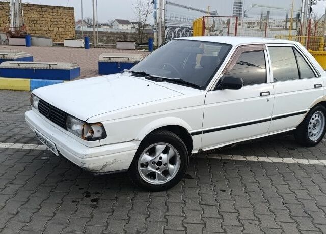 Белый Ниссан Санни, объемом двигателя 1.3 л и пробегом 260 тыс. км за 550 $, фото 5 на Automoto.ua