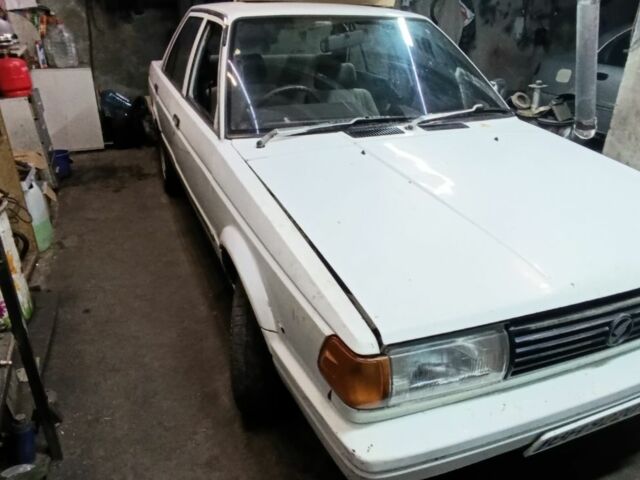 Белый Ниссан Санни, объемом двигателя 1.3 л и пробегом 240 тыс. км за 475 $, фото 2 на Automoto.ua