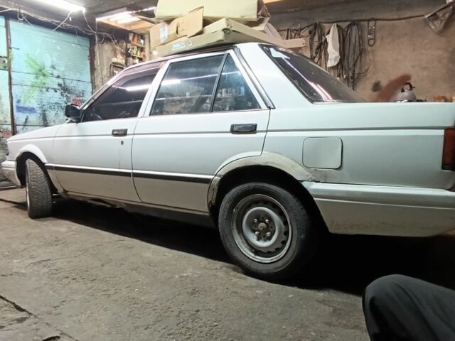 Белый Ниссан Санни, объемом двигателя 1.3 л и пробегом 240 тыс. км за 475 $, фото 4 на Automoto.ua