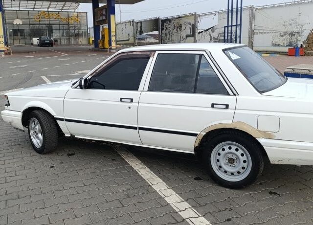 Белый Ниссан Санни, объемом двигателя 1.3 л и пробегом 260 тыс. км за 550 $, фото 4 на Automoto.ua