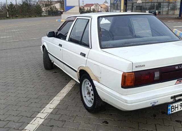 Белый Ниссан Санни, объемом двигателя 1.3 л и пробегом 260 тыс. км за 550 $, фото 3 на Automoto.ua