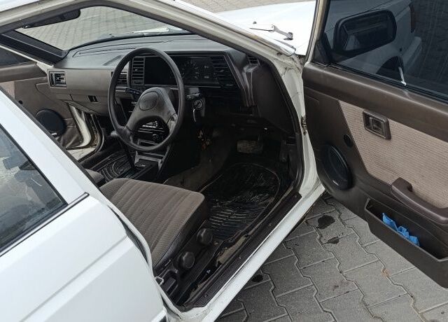 Белый Ниссан Санни, объемом двигателя 1.3 л и пробегом 260 тыс. км за 550 $, фото 6 на Automoto.ua