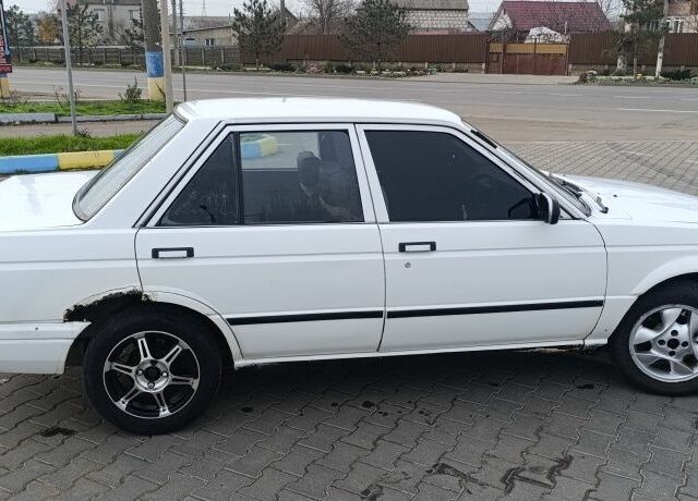 Белый Ниссан Санни, объемом двигателя 1.3 л и пробегом 260 тыс. км за 550 $, фото 2 на Automoto.ua