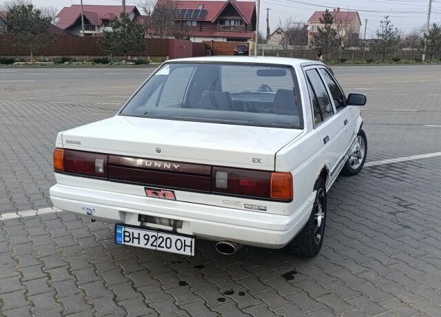 Белый Ниссан Санни, объемом двигателя 1.3 л и пробегом 260 тыс. км за 550 $, фото 1 на Automoto.ua