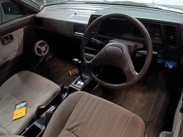 Белый Ниссан Санни, объемом двигателя 1.3 л и пробегом 240 тыс. км за 475 $, фото 3 на Automoto.ua