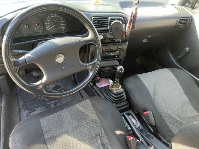 Белый Ниссан Санни, объемом двигателя 1.4 л и пробегом 280 тыс. км за 1500 $, фото 2 на Automoto.ua