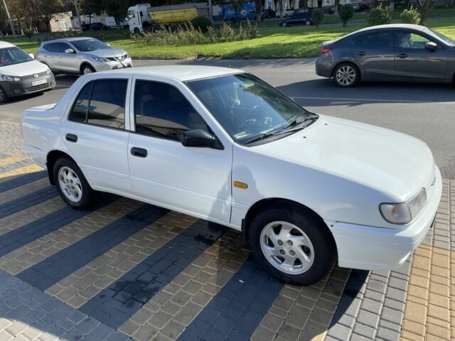Белый Ниссан Санни, объемом двигателя 1.4 л и пробегом 280 тыс. км за 1500 $, фото 1 на Automoto.ua