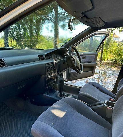 Белый Ниссан Санни, объемом двигателя 1.5 л и пробегом 298 тыс. км за 1440 $, фото 3 на Automoto.ua