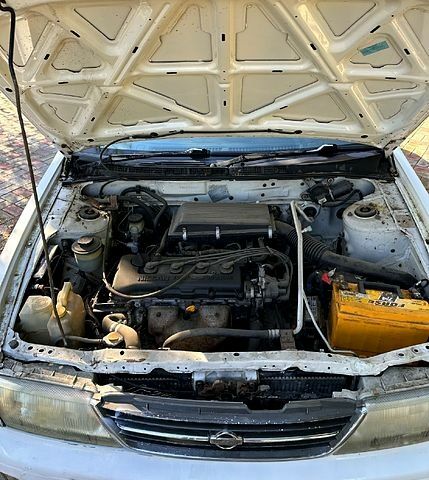 Белый Ниссан Санни, объемом двигателя 1.5 л и пробегом 298 тыс. км за 1440 $, фото 5 на Automoto.ua