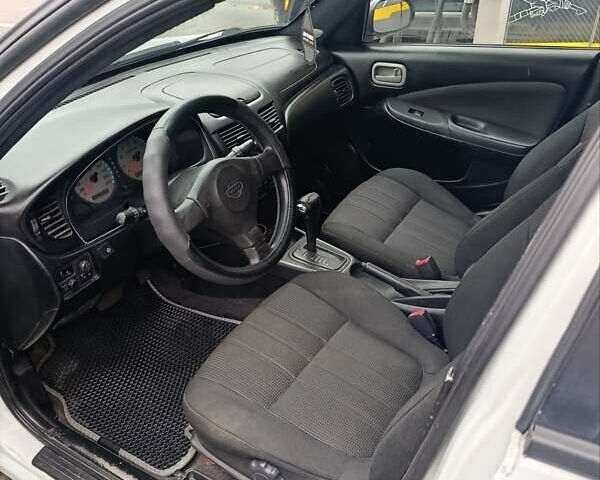 Белый Ниссан Санни, объемом двигателя 1.8 л и пробегом 214 тыс. км за 3068 $, фото 2 на Automoto.ua