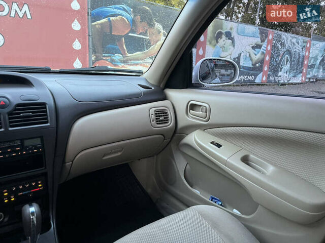 Білий Ніссан Санні, об'ємом двигуна 1.6 л та пробігом 174 тис. км за 6000 $, фото 12 на Automoto.ua