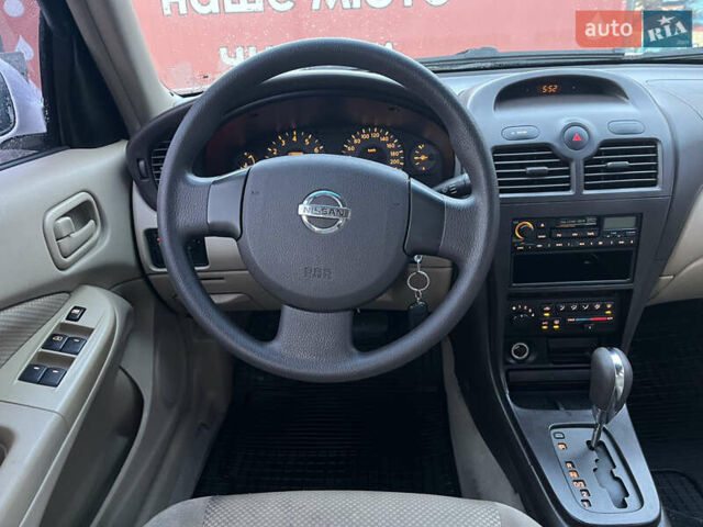 Білий Ніссан Санні, об'ємом двигуна 1.6 л та пробігом 174 тис. км за 6000 $, фото 11 на Automoto.ua