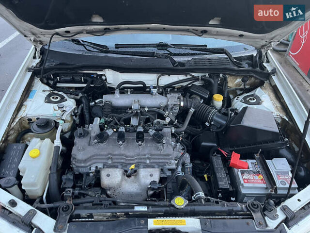 Білий Ніссан Санні, об'ємом двигуна 1.6 л та пробігом 174 тис. км за 6000 $, фото 14 на Automoto.ua