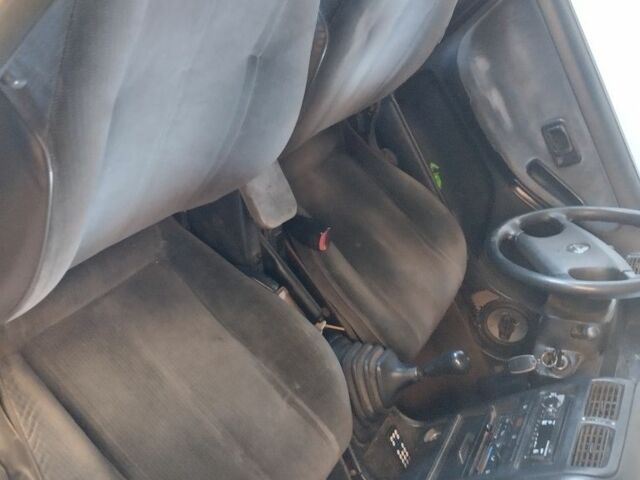 Белый Ниссан Санни, объемом двигателя 1.4 л и пробегом 333 тыс. км за 1000 $, фото 4 на Automoto.ua