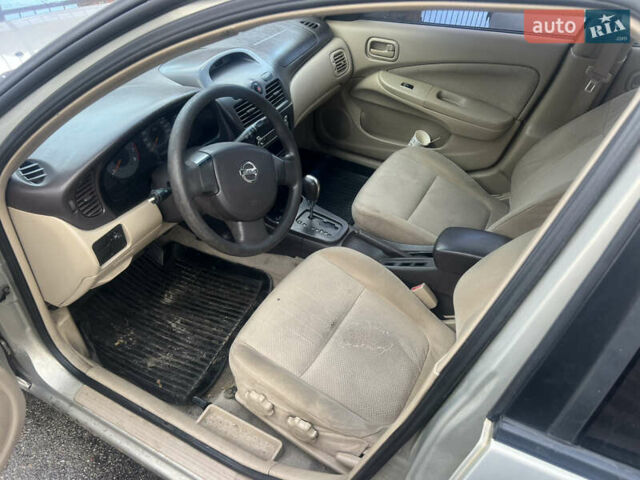 Бежевий Ніссан Санні, об'ємом двигуна 1.6 л та пробігом 200 тис. км за 2400 $, фото 6 на Automoto.ua