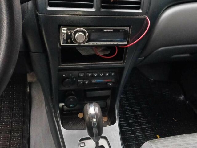 Чорний Ніссан Санні, об'ємом двигуна 1.6 л та пробігом 182 тис. км за 3600 $, фото 16 на Automoto.ua