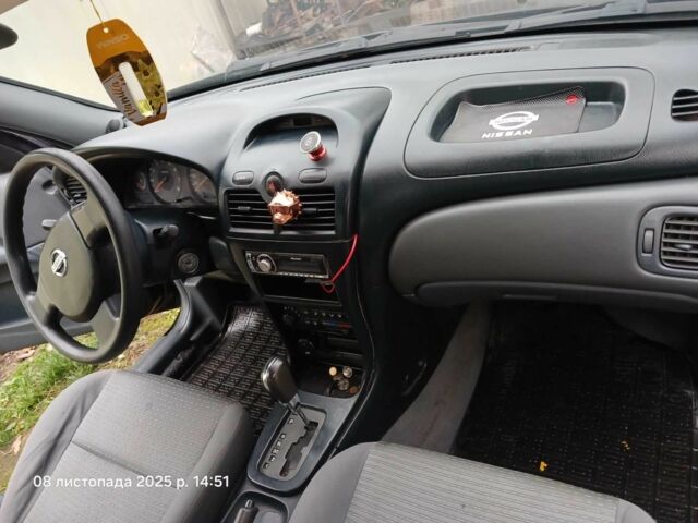 Чорний Ніссан Санні, об'ємом двигуна 1.6 л та пробігом 182 тис. км за 3600 $, фото 14 на Automoto.ua