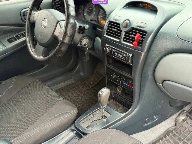 Чорний Ніссан Санні, об'ємом двигуна 1.6 л та пробігом 250 тис. км за 5400 $, фото 4 на Automoto.ua