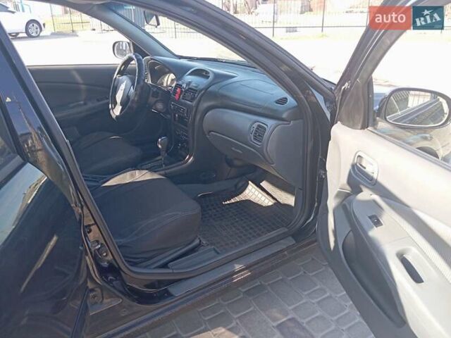 Черный Ниссан Санни, объемом двигателя 1.6 л и пробегом 225 тыс. км за 4899 $, фото 7 на Automoto.ua