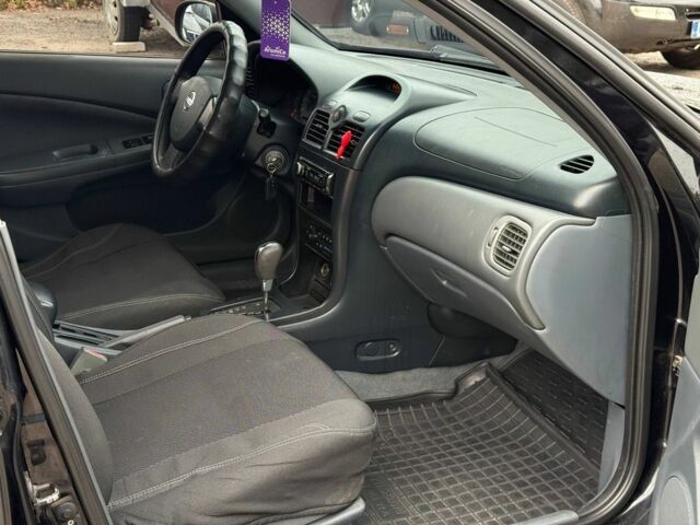 Чорний Ніссан Санні, об'ємом двигуна 1.6 л та пробігом 250 тис. км за 5400 $, фото 5 на Automoto.ua