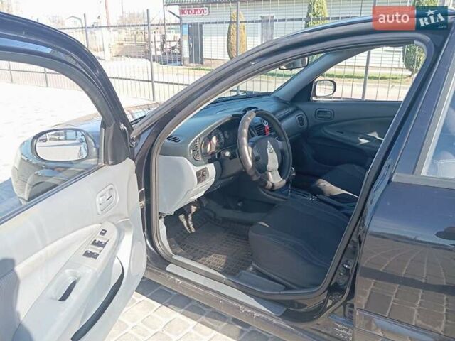 Черный Ниссан Санни, объемом двигателя 1.6 л и пробегом 225 тыс. км за 4899 $, фото 6 на Automoto.ua