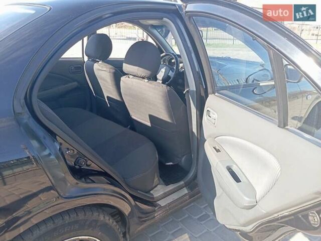 Черный Ниссан Санни, объемом двигателя 1.6 л и пробегом 225 тыс. км за 4899 $, фото 8 на Automoto.ua