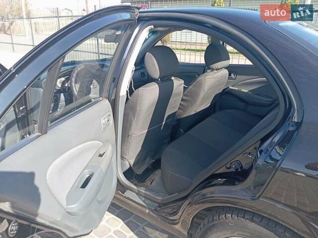 Черный Ниссан Санни, объемом двигателя 1.6 л и пробегом 225 тыс. км за 4899 $, фото 9 на Automoto.ua