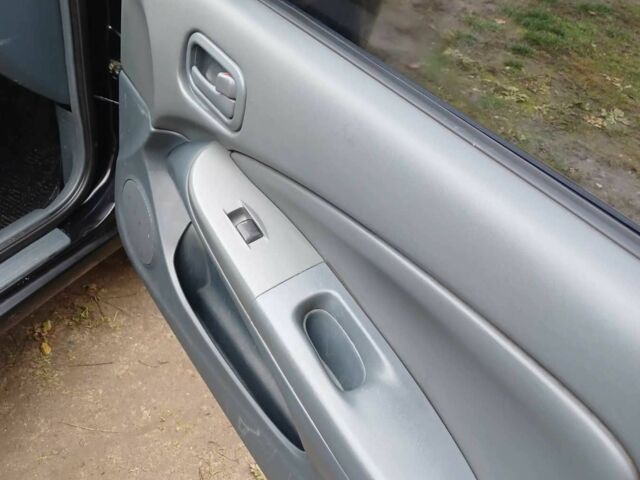 Чорний Ніссан Санні, об'ємом двигуна 1.6 л та пробігом 182 тис. км за 3600 $, фото 13 на Automoto.ua