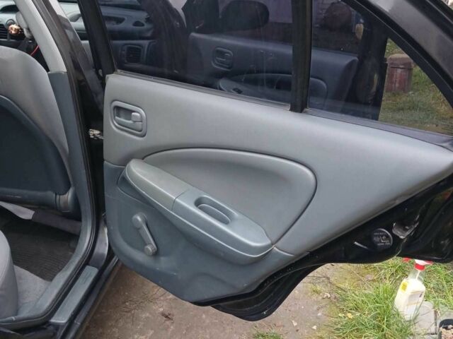 Чорний Ніссан Санні, об'ємом двигуна 1.6 л та пробігом 182 тис. км за 3600 $, фото 10 на Automoto.ua