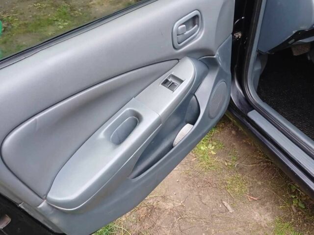 Чорний Ніссан Санні, об'ємом двигуна 1.6 л та пробігом 182 тис. км за 3600 $, фото 17 на Automoto.ua