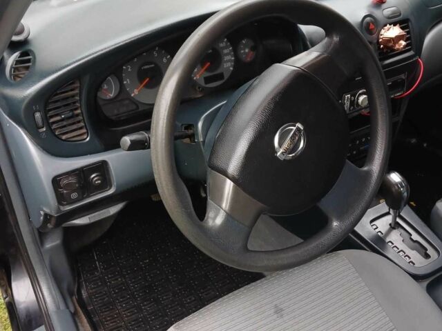 Чорний Ніссан Санні, об'ємом двигуна 1.6 л та пробігом 182 тис. км за 3600 $, фото 15 на Automoto.ua