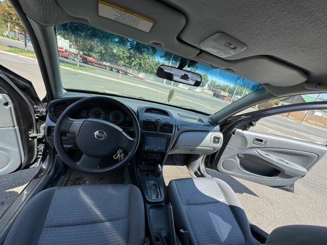 Черный Ниссан Санни, объемом двигателя 1.6 л и пробегом 195 тыс. км за 4200 $, фото 6 на Automoto.ua