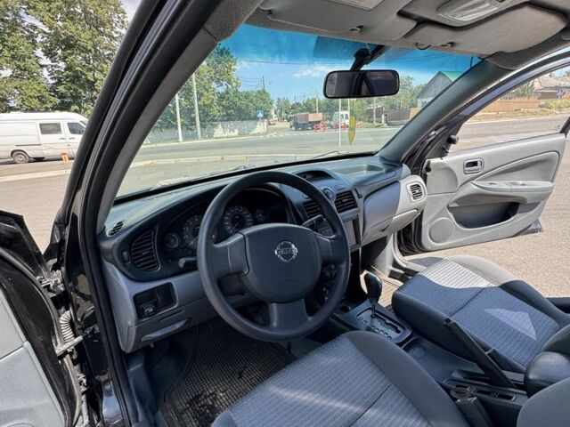 Черный Ниссан Санни, объемом двигателя 1.6 л и пробегом 195 тыс. км за 4200 $, фото 5 на Automoto.ua