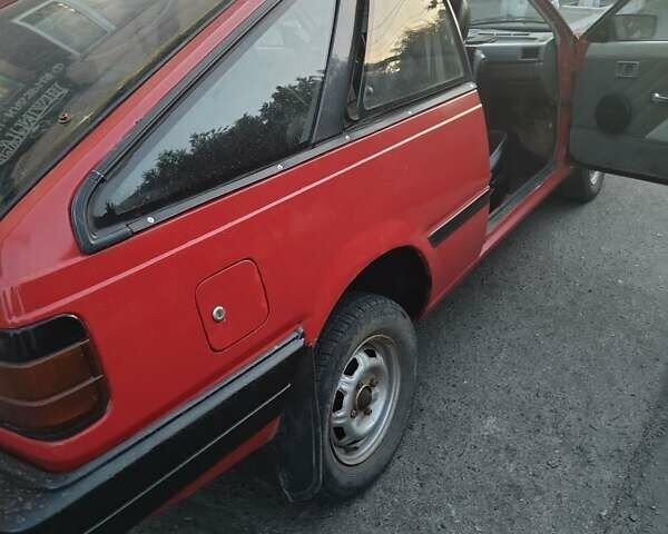 Красный Ниссан Санни, объемом двигателя 1.5 л и пробегом 318 тыс. км за 950 $, фото 1 на Automoto.ua